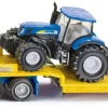 Freightliner LKW mit New Holland Traktoren