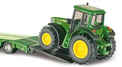 Freightliner Tieflader mit John Deere Traktoren