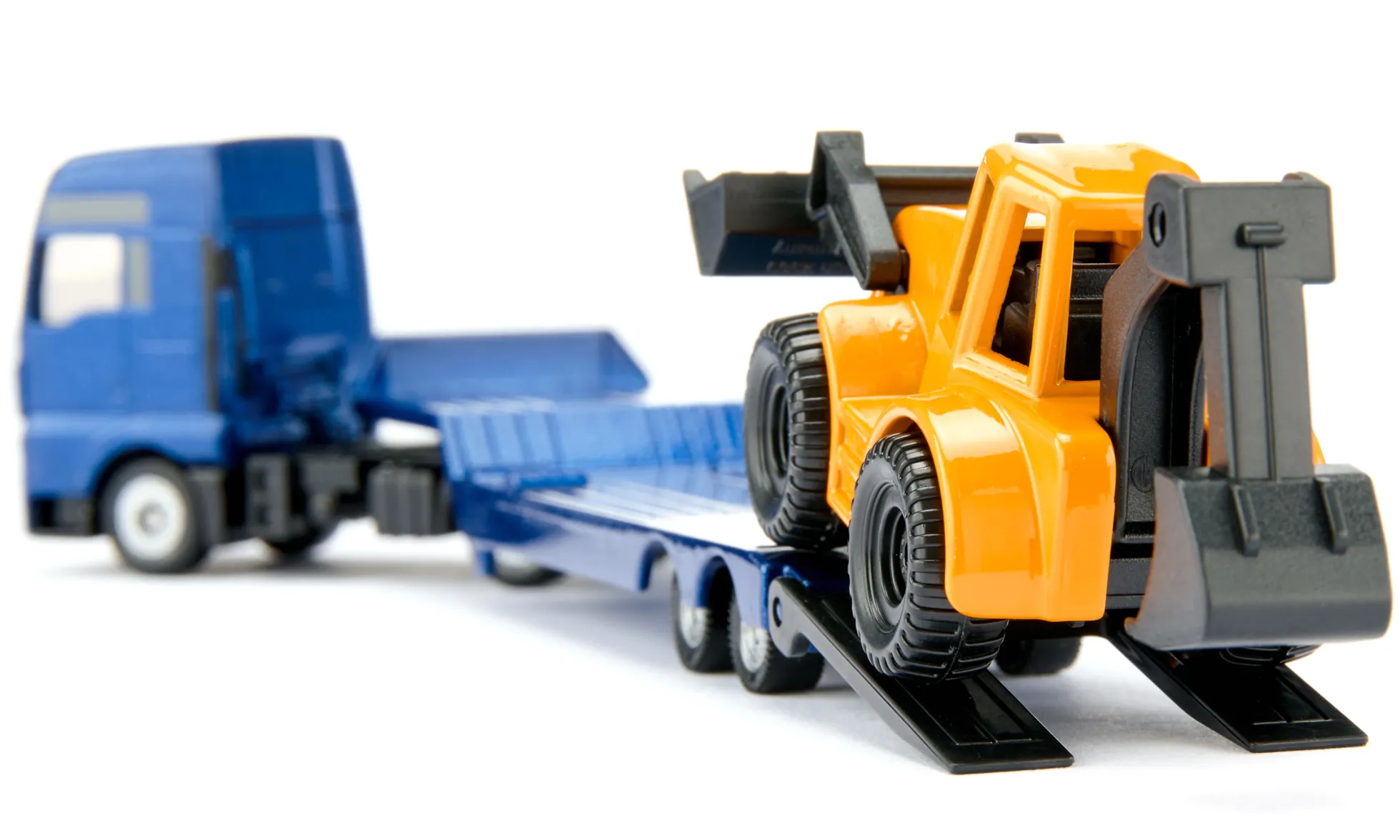 MAN Lkw mit Baggerlader