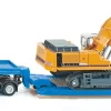 MAN Schwertransporter mit Liebherr Bagger
