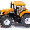 New Holland Traktor mit Räumschild und Streuer