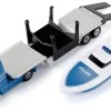 Volvo Lkw mit Boot